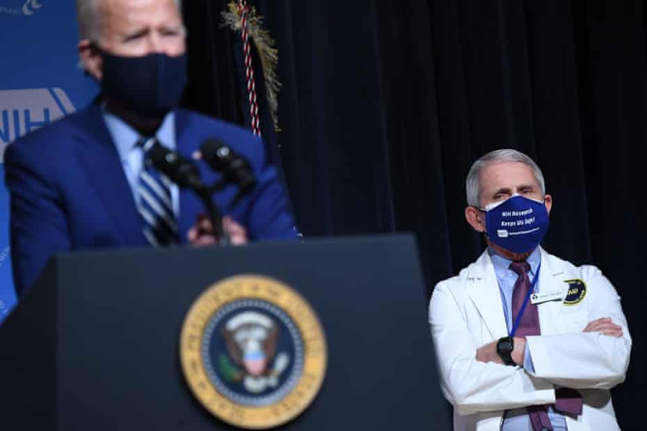 Anthony Fauci looks on as President Joe Biden speaks in Maryland last month