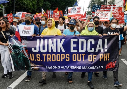 Protesters mark the Philippines’ 125th Independence Day in June. News of the enhanced military ties with the US did not go down well in all sectors.