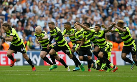 Huddersfield’s players celebrate after winning their first promotion to the Premier League.