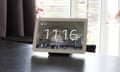 Amazon Echo Hub display showing the idle photo frame with clock