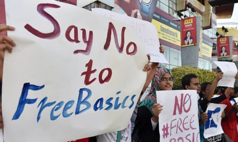 Indian demonstrators hold placards during a protest against Facebook’s Free Basics initiative in Bangalore.