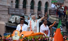 India's PM Modi waves to his supporters during a roadshow in Puri<br>India's Prime Minister Narendra Modi waves to his supporters during a roadshow as part of his election campaign during the ongoing general election, in Puri district of the eastern state of Odisha, India, May 20, 2024. REUTERS/Stringer