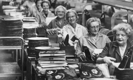 Factory workers packaging The Beatles’ new album Rubber Soul.