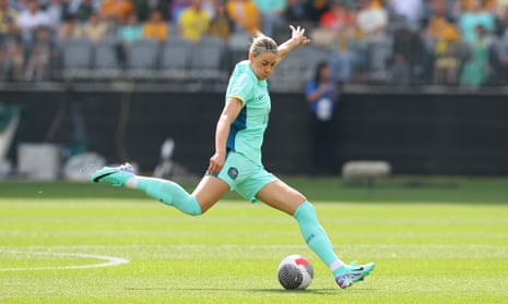 Matildas star Emily Van Egmond crosses the ball at Optus Stadium.