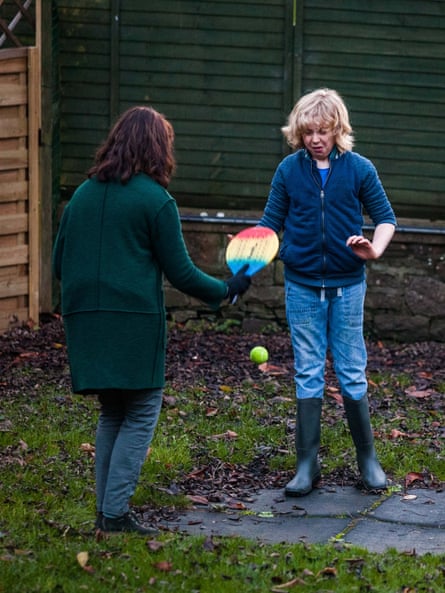 Jonah Maxwell playing at bat and ball with his mother, Annette