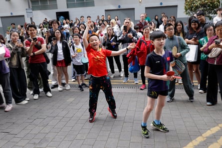 China supporters outside the Hilton Hotel next to Wembley, trying to catch a glimpse of their favourite players