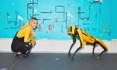Agnieszka Pilat with one of the Boston Dynamics dogs she uses to paint