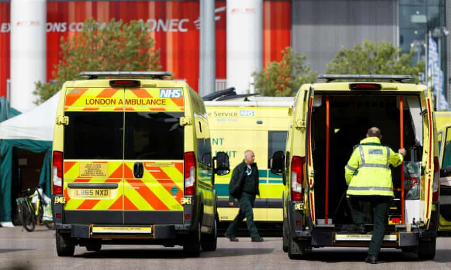 Ambulances and staff outside the NHS Nightingale hospital at the Excel Centre in May.