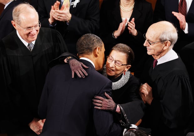 Ruth Bader Ginsburg embracing Barack Obama before his State of the Union address in 2011, with fellow supreme court justices Anthony Kennedy, left, and Stephen Breyer.