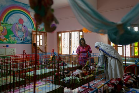 Jane visits orphaned babies at the Mother Teresa Orphanage, in the same room she once occupied.