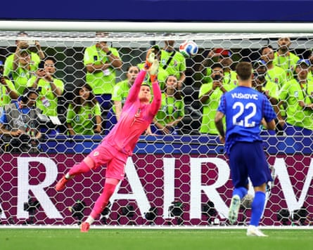 Dominik Livakovic makes a save