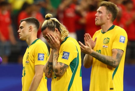 Australia’s Paul Okon Engstler, Jackson Irvine and Harry Souttar look dejected after their World Cup elimination by Egypt