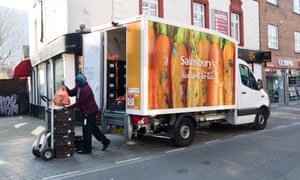 Coronavirus live news: Wuhan risk remains high, says party chief, as Trump blasts states 10 A Sainsbury’s supermarket delivery van and driver seen on empty streets in Brick Lane, east London, Britain, 27 March 2020.