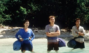 Leonardo DiCaprio, centre, Guillaume Canet, right and Virginie Ledoyen, left, n a scene from The Beach.
