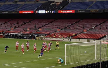 The Barcelona forward Lionel Messi takes and scores a penalty with a Panenka against Atletico Madrid. The stadium is almost empty due to the Covid-19 pandemic.