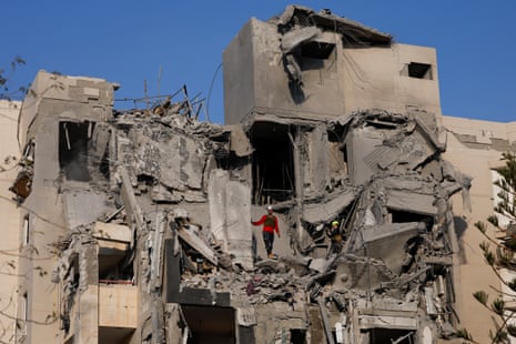Emergency personnel work at an impacted residential site, following a missile attack from Iran on Israel, amid the Israel-Iran conflict in Be'er Sheva, Israel 24 June, 2025.