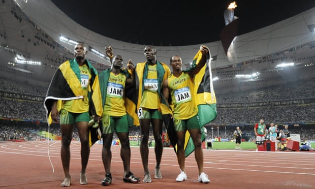 Jamaica's Asafa Powell, Nesta Carter, Usain Bolt and Michael Frater celebrate after winning the men's 4x100m relay at the 2008 Olympic Games in Beijing