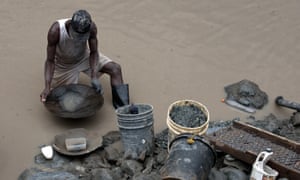 Colombian miner search for gold near a gold mine that collapsed in San Antonio.