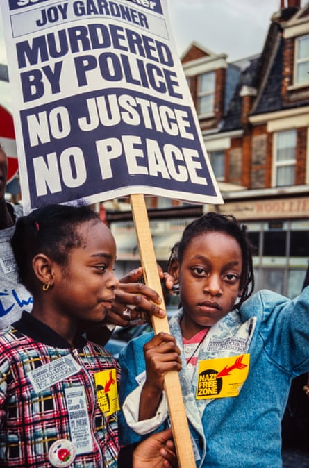Protesters carrying a banner saying “Murdered by police. No justice no peace” on 7 August 1983, after the death of Joy Gardner