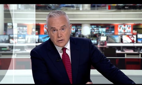 Huw Edwards presenting the news