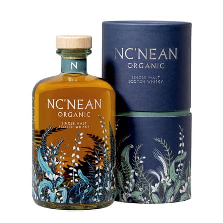 Nc’nean ORGANIC SINGLE MALT SCOTCH WHISKY bottle and round purple box with botanical illustrations.