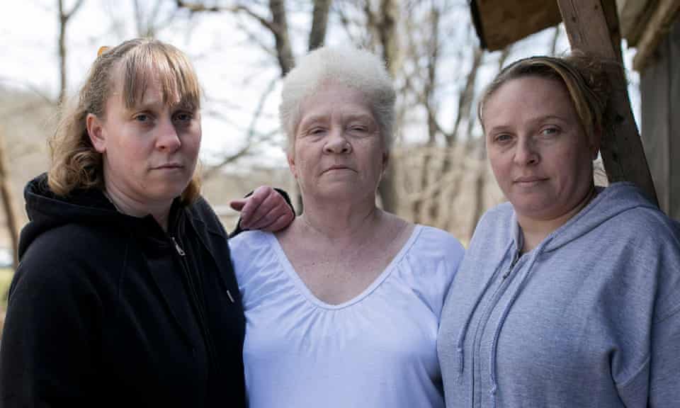 Roberta Oiler, center, stands with her daughters Janelle Stanley and Jessica Keaton in East Jackson, Ohio.