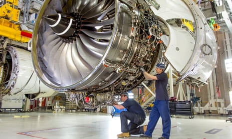Engineers work on a Rolls-Royce Trent XWB engine.