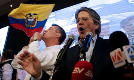 Ecuadorean presidential candidate Guillermo Lasso speaks to supporters in a hotel in Guayaquil.