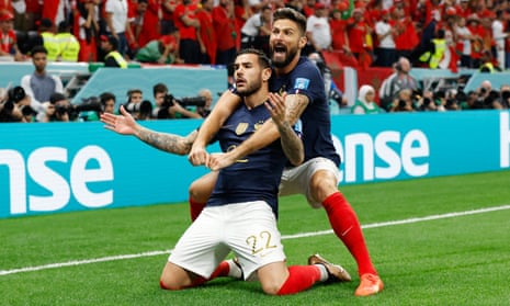 Théo Hernandez celebrates with Olivier Giroud after giving France the lead.
