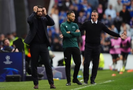 Russell Martin holds his head in anguish