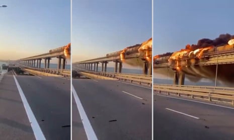 Russia-Ukraine war live: fire engulfs crucial Kerch bridge between Crimea  and Russia as section collapses