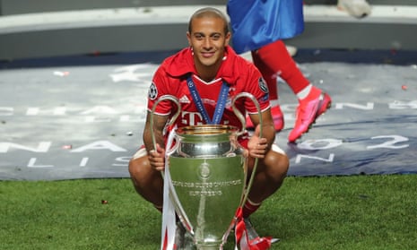 Thiago Alcântara with the Champions League trophy