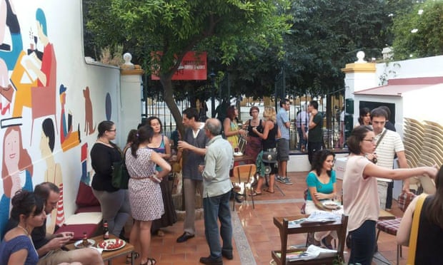 El Viajero Sedentario cafe/meeting place with its courtyard and orange tree.