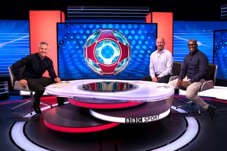 Gary Lineker, Alan Shearer, Ian Wright pose for a photo while presenting Match of the Day in 2018