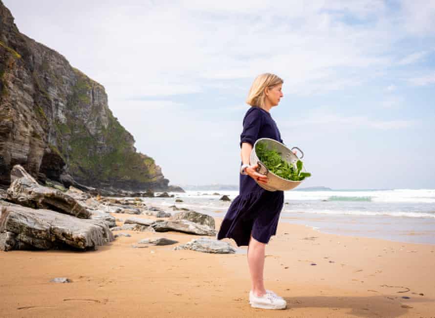 Chef Emily Scott on the beach at Watergate Bay.