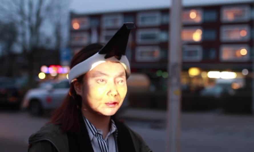 Design student Jing-cai Liu has created a wearable face projector to counter surveillance cameras.