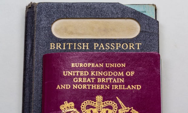 Old-style British passport with EU British passport on top