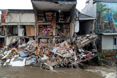 Goods lie scattered at a fabric store that collapsed after being hit by floods following overnight heavy rains in Denpasar, Bali, 10 September, 2025.