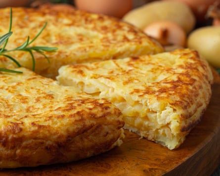 A thick omelette with potatoes and onion