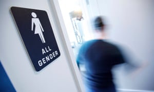 A bathroom sign at the Cacao Cinnamon coffee shop in Durham North Carolina, where a bill forcing transgender people to use restrooms according to the sex assigned at birth has sparked a national row.