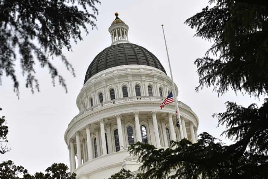 Sacramento: second suspect arrested as key questions go unanswered | California 4 The white dome of the state capitol building is framed by tree branches.