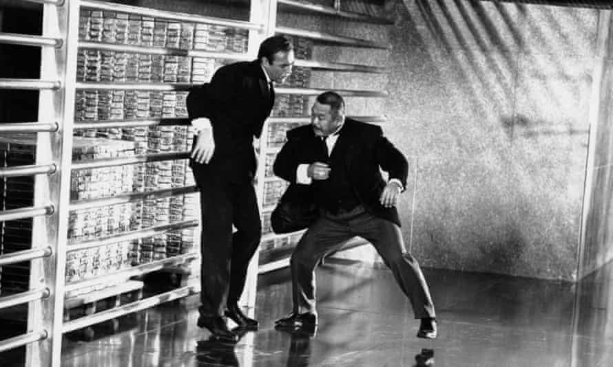 Goldfinger: Sean Connery as James Bond fights with Harold Sakata’s Oddjob the bullion in Fort Knox’s gold depository.