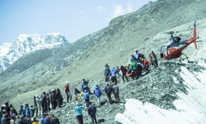 A rescue helicopter returns to Everest base camp after the 2014 avalanche