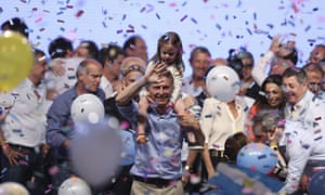 Mauricio Macri celebrates winning the Argentinian presidential runoff.