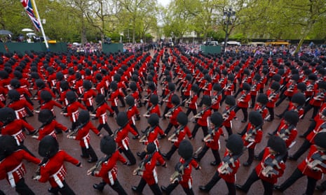 Troops march within coronation procession from Westminster Abbey to Buckingham Palace after the coronation.