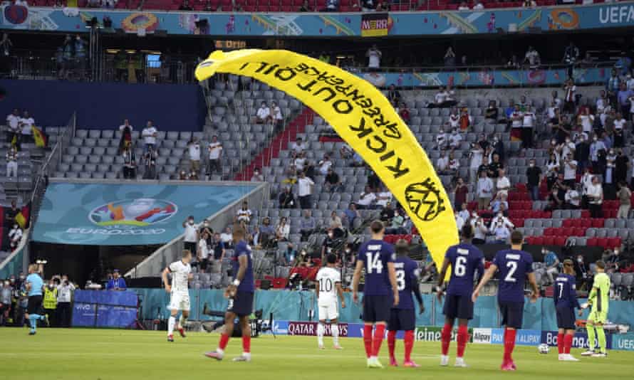 Greenpeace activist lands on the pitch before the Euro 2020 match between France and Germany at the Allianz Arena in Munich
