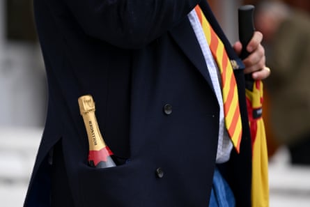 A bottle of champagne in an MCC members pocket during the first Test at Lord’s