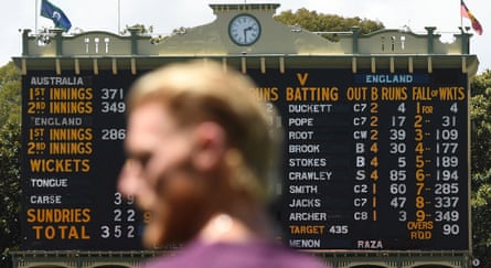 The Adelaide scoreboard displays how this third Test unfolded, as Ben Stokes waits in the foreground