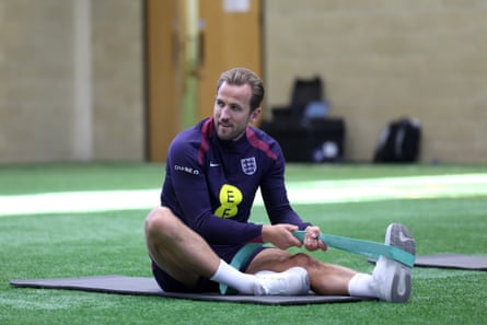 Harry Kane stretches during a training session