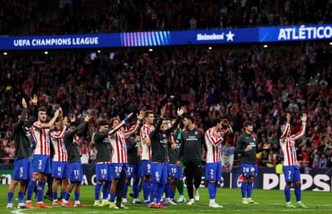 Atlético Madrid salute their fans after the victory against Club Brugge